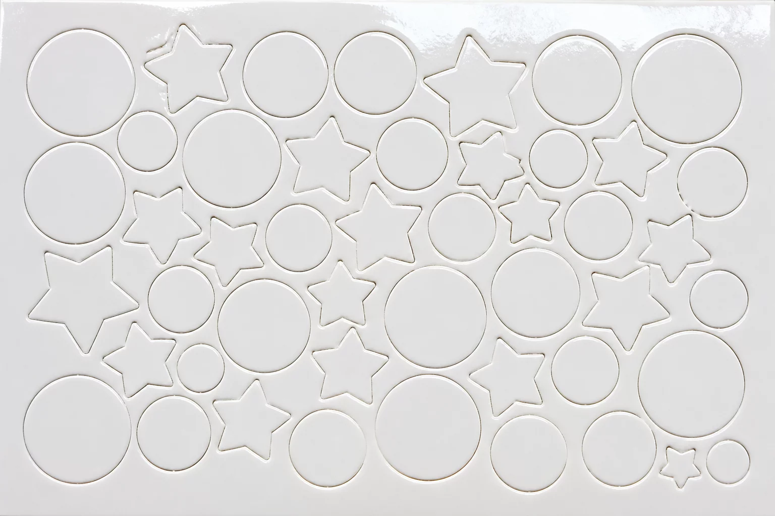 A single sheet densely packed with small, colorful sticker outlines.